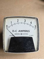Front view of GE DC ammeter showing dial 0–5A and branding