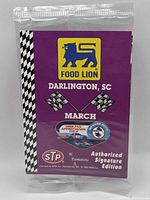 Front of sealed Richard Petty promotional card pack showing Food Lion logo, Darlington SC, STP and Authorized Signature Edition text