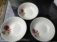 Top view of three bowls showing floral pattern and quantity