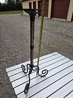 Full view showing candle holder height against tape measure