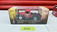 Boxed Liberty Classics Canadian Tire 1947 International Pickup die-cast model truck coin bank