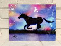 Front of signed unicorn print showing artwork and signature