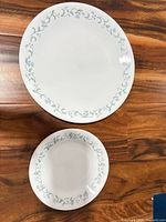 Dinner and salad plate showing Country Cottage pattern