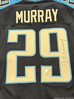 Full view of signed #29 on back of jersey showing autograph and hologram sticker