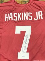 Full back view showing name, number, autograph