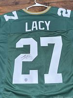 Full back view showing name, number, autograph and hologram sticker