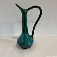 Front view of ewer showing full form and glaze