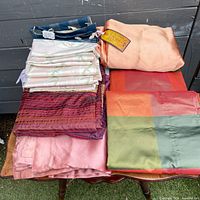 Stack of assorted folded panels showing variety of colours and textures
