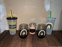 Full lot showing both tumblers, both wine glasses, and bath salt jar