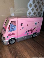 Closed Barbie camper van, exterior pink and silver with decals