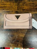 Front view of wallet with tag attached