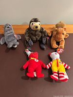 Group shot of five plush toys