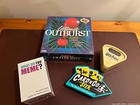 All four games laid out showing front packaging