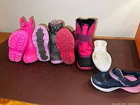 Overview of all four pairs showing soles and uppers