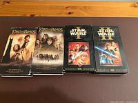 Front covers of all four VHS tapes