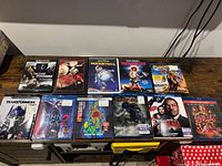 Overhead view of all ten movie cases in two rows
