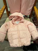 Jacket front view with hood and matching pants