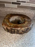 Top view of onyx ashtray showing bowl and rests