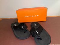 Sandals with orange Rocket Dog box
