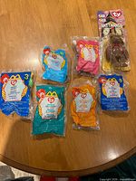 Group shot of all sealed Teenie Beanies and carded Britannia