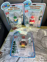 All three Webkinz ornaments in packaging