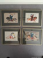 All four framed prints displayed together