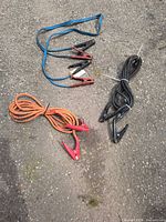 All three booster cable sets laid out