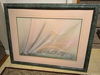 Full view of framed artwork showing design, frame and mat