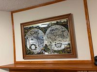 Full view of framed map on wall