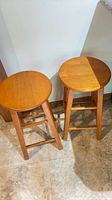 Pair of round solid wood stools top view