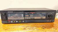 Front view of Pioneer CT-660 cassette deck showing controls, cassette bay and display