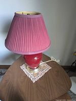 Lamp assembled with shade on small table