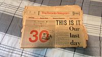 Front of stack showing headline 'THIS IS IT Our last day' and date Oct 30 1971