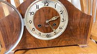 Front view of Walter Clocks Style 500 mantel clock with glass door open