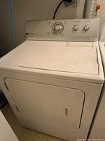 Full view of Maytag dryer showing front, door, and control panel