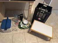 Group shot of all items arranged on tiled floor