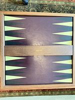 Drueke wood case closed showing burgundy and cream backgammon surface