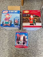 Three boxed inflatables displayed together