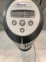 Top control panel showing Oreck XL branding, buttons and indicator lights