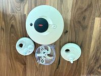 Main lid, two white accessory lids, clear chopper bowl