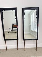Front view of both mirrors showing frames and legs