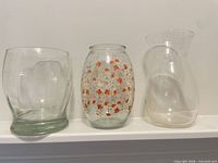 All three glass vases side by side
