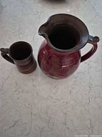 Pitcher and mug top view showing glaze and interior