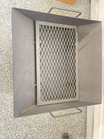 Top view showing removable mesh grate and interior