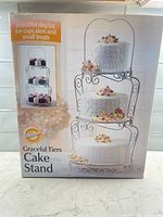 Front of boxed Wilton Graceful Tiers Cake Stand