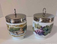 Two jumbo egg coddlers side by side showing patterns and metal lids