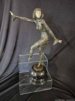 Full view of bronze Art Deco dancer on wood base