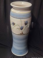 Full view of tall hand-painted vase