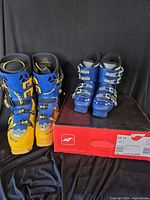 Both pairs of boots side by side with Nordica box visible