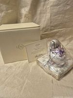 Lenox box, COA and wrapped Cheshire Cat figurine